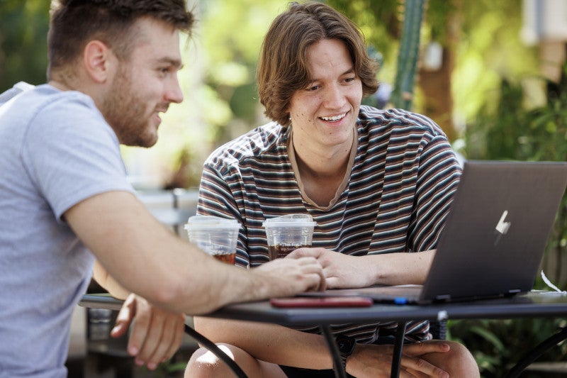 students looking at a computer